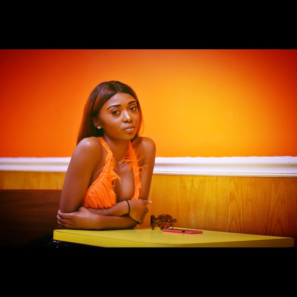 Orange fuzzy crop top
